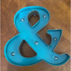 Light up & ampersand sign by apothecary